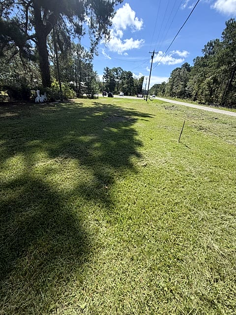 Property after roadside lot mowing and cleanup